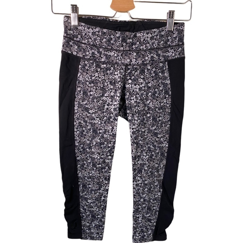 Athleta crop length leggings. Sz XS. Black, gray and white floral pattern - Picture 3 of 14